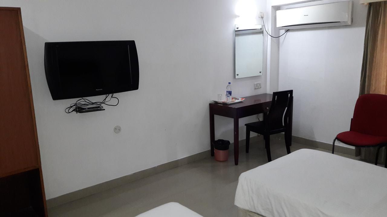 Hôtel Aroma Residency à Tinsukia Extérieur photo